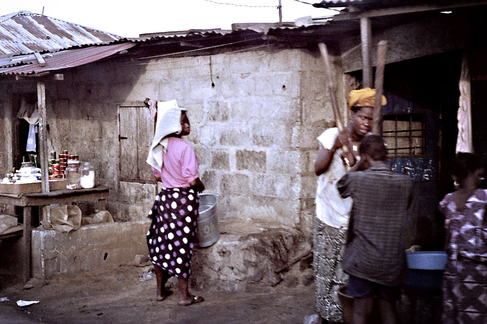 20. Woman with bucket-Nigeria.jpg