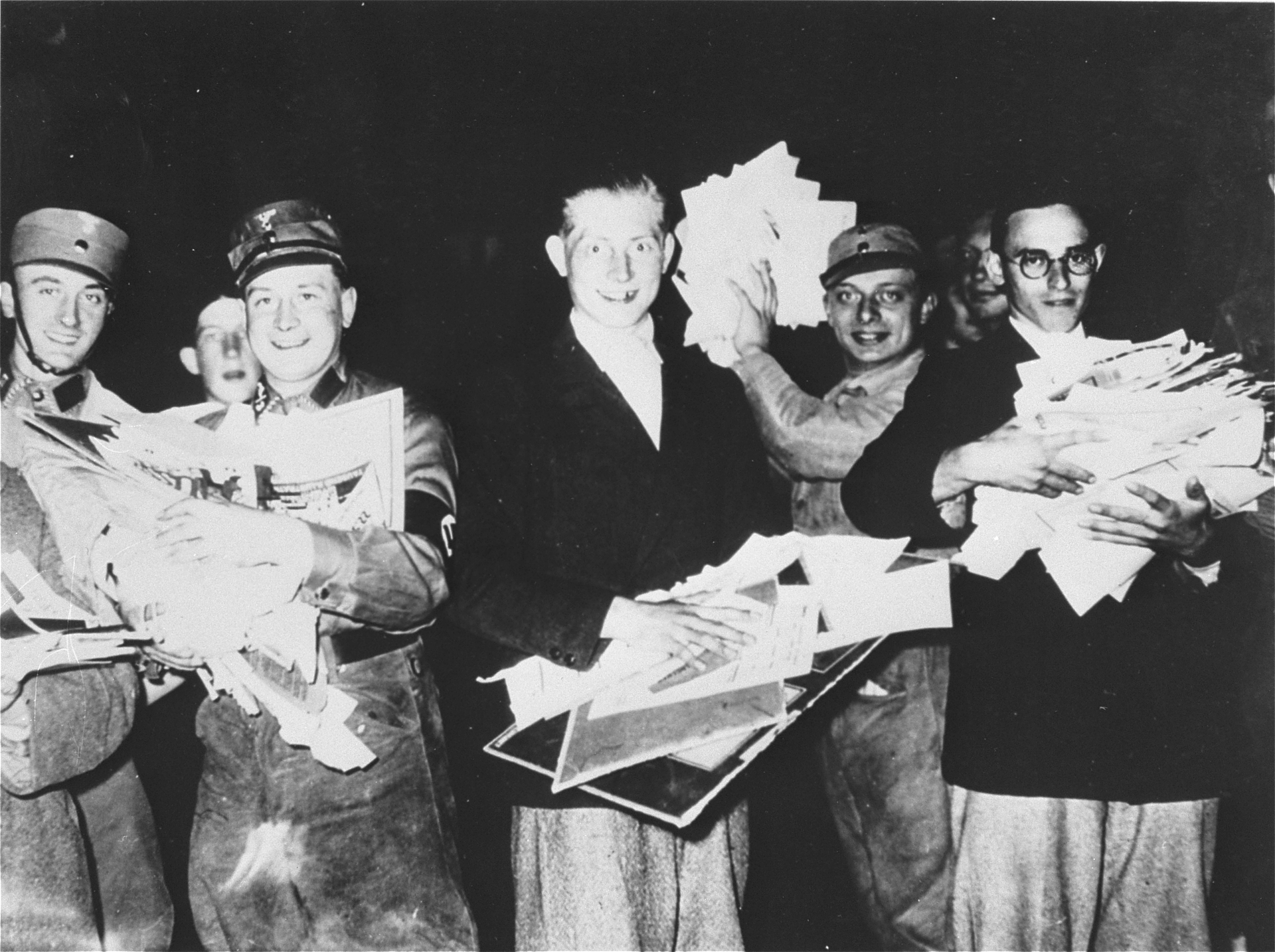 69031_students and SA members carry piles of un-German literature.jpg